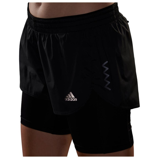 Adidas Γυναικείο σορτς-κολάν RNFAST 2IN1 Adidas Γυναικείο σορτς-κολάν RNFAST 2IN1